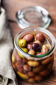 Olives in natural brining tanks